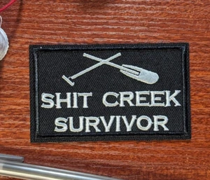 Sh!t's Creek Survivor Patch 2x3.5" Broken Canoe Paddle Embroidered Iron On - Picture 1 of 3