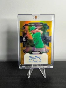 2024 Prizm LIV Golf Branden Grace Gold Prizm Auto /10 SIG-BGR - Picture 1 of 2