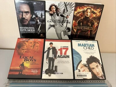 6 DVDs: Local Boys, 17 Again, The Hunger Games, Sherlock Holmes + 2- READ - Image 1 of 4