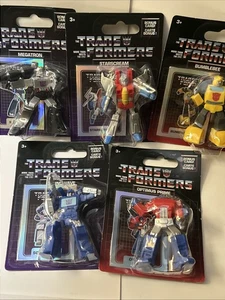 Transformers 2 inch Figur Optimus Prime Bumblebee Soundwave Megatron Starscream - Bild 1 von 8