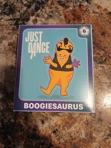 McDonald's Happy Meal Toy #6 Just Dance Boogiesaurus Dinosaur 2024 - Picture 1 of 4
