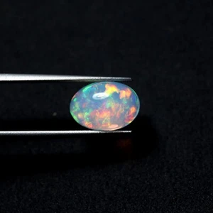 3.3 Cts 12.5x8.8 MM Natural AAA Flashy Multi Fire Ethiopian Opal Oval Cabochon - Picture 1 of 11