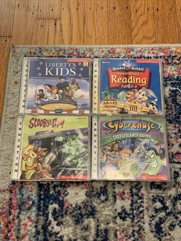 Lot of 4 The Learning Company Reader Rabbit Cyber chase Scooby Doo Liberty Kids - Image 1 of 1