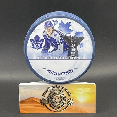 Official Auston Matthews Commemorative Hockey Puck 2021 Limited Edition #d /134 - Image 1 of 2