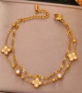 Armband mehrlagiges Kleeblatt 18 Karat vergoldet Zirkonia Dekor Edelstahl - Bild 1 von 5