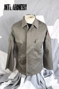 EAST GERMAN ARMY DDR ISSUED FIELD SHIRTS SIZE K48 ( MEDIUM- SHORT ) - Bild 1 von 3