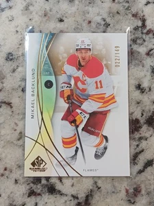 Mikael Backlund /149 Gold 2024-25 UD SP gioco usato Calgary Flames - Foto 1 di 2