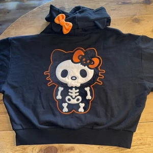 Felpa con cappuccio Hello Kitty x Forever 21 Skeleton Halloween taglia MEDIA nuova senza etichette nera arancione - Foto 1 di 12