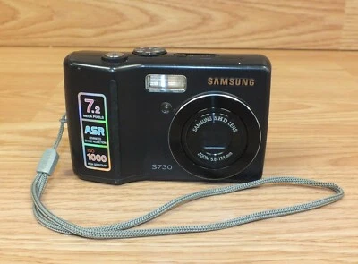 *PARA REPARACIÓN* Cámara digital Samsung Digimax S730 7,4 MP negra con correa para muñeca  Foto 1 de 4
