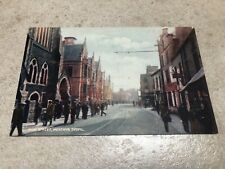 1900s colour postcard .high street  merthyr tydfil with people !