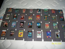 Lot Of 32 NES Games  SUPER MARIO  RAMBO RING KING EXCITEBIKE DRAGON WARRIOR JAWS