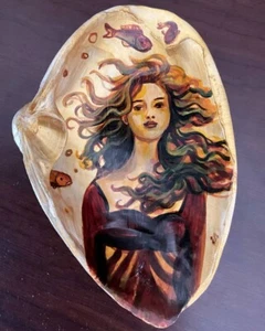 conchiglia oceanica con foto - Foto 1 di 3