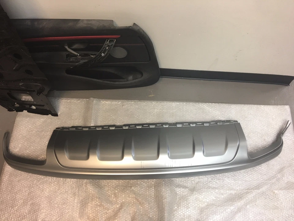  Оригинальный молдинг крышка спойлера заднего бампера Audi Q7 2016 2017 годов выпуска - Изображение 1 из 4