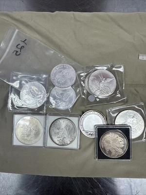 Lote mixto de plata fina .999 aleatoria de 10 oz - barras | rondas | monedas Foto 1 de 4