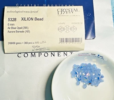 Swarovski 5328 6mm AIR BLUE OPAL AB Austrian Bi-cone Beads 144pcs Open pack. - Image 1 of 3