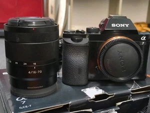 Sony Zeiss 16-70mm F4 ZA OSS Vario Lens E Mount APS-C GOOD USED w hood - Picture 1 of 2