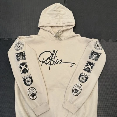 Sudadera con Capucha Pullover Young And Reckless LA Beige Tostado Para Hombre Manga L Parche Gráficos Foto 1 de 4