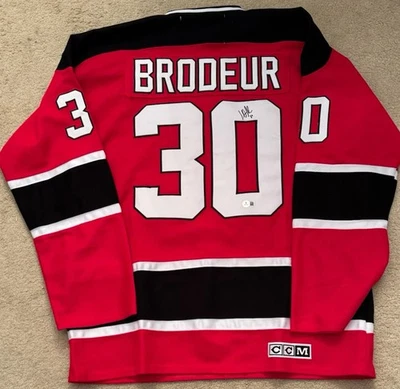 MARTIN BRODEUR SIGNED NEW JERSEY DEVILS SIGNED JERSEY XL BECKETT COA HAND SIGNED - Image 1 of 4