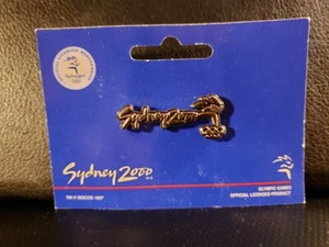 Spilla Olimpica Sydney 2000 tono oro - "Sydney 2000" con logo olimpico - come nuova - Foto 1 di 1