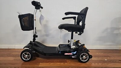 Scooter de viaje EV Rider Nomad de 4 ruedas - CAJA ABIERTA Foto 1 de 3