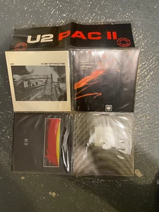 U2 PAC II - 4 7" Vinyl Discs - EXCLUSIVE TO IRELAND - RARE - GOOD CONDITION - Picture 1 of 6