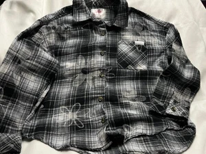Lot 4038- JUSTICE- Girl's Black Flannel Top- Size 10 - Picture 1 of 2