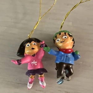 SET OF 2 DORA THE EXPLORER Miniature Ice skating  Christmas Ornaments - Bild 1 von 2