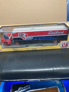M2 1:64 Auto-Haulers Edelbrock 1958 Chevy Spartan LCF Tractor-Trailer Red/Black - Picture 1 of 6