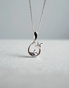 Brillante collar redondo incoloro con elementos de Swarovski enchapado en oro de 18 quilates - Imagen 1 de 4