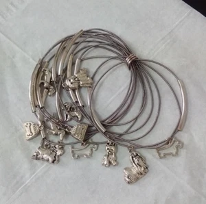 Sterling Silver cluster bracelets / bangles with 11 silver dog charms / pendants - Picture 1 of 18