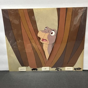 The Land Before Time 1988 Movie Art Animation Production Cel Littlefoot In Grass - Picture 1 of 7