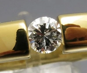 DISEÑO MADURO - ANILLO DE TENSIÓN TOPCHÄNER G/IF BRILLANTE - ORO 585 - CLÁSICO - Imagen 1 de 8