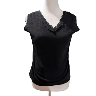 Camiseta sin mangas tejida negra mediana sin mangas Chico para mujer talla 1 usada en excelente estado Foto 1 de 4