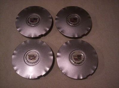 10-16 Cadillac SRX set of (4) OEM Metalic Silver Center Caps   9599024 - Image 1 of 3