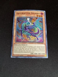 Materiactor Gigadra - Yugioh Blazing Vortex - Super Rare - BLVO-EN081 - NM/MINT - Picture 1 of 2