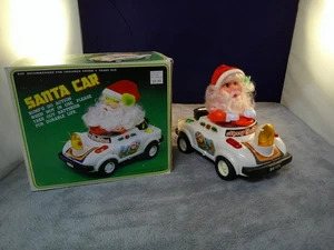 Vintage Woolworth Bump and Go beleuchtetes Weihnachtsmannauto Frohe Weihnachten (braucht Batterien - Bild 1 von 4