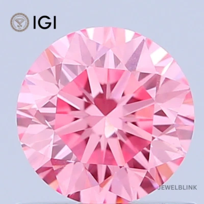 IGI Certified 0.77 Carat Fancy Vivid Pink VVS2 Round Cut CVD Lab Grown Diamond - Image 1 of 4