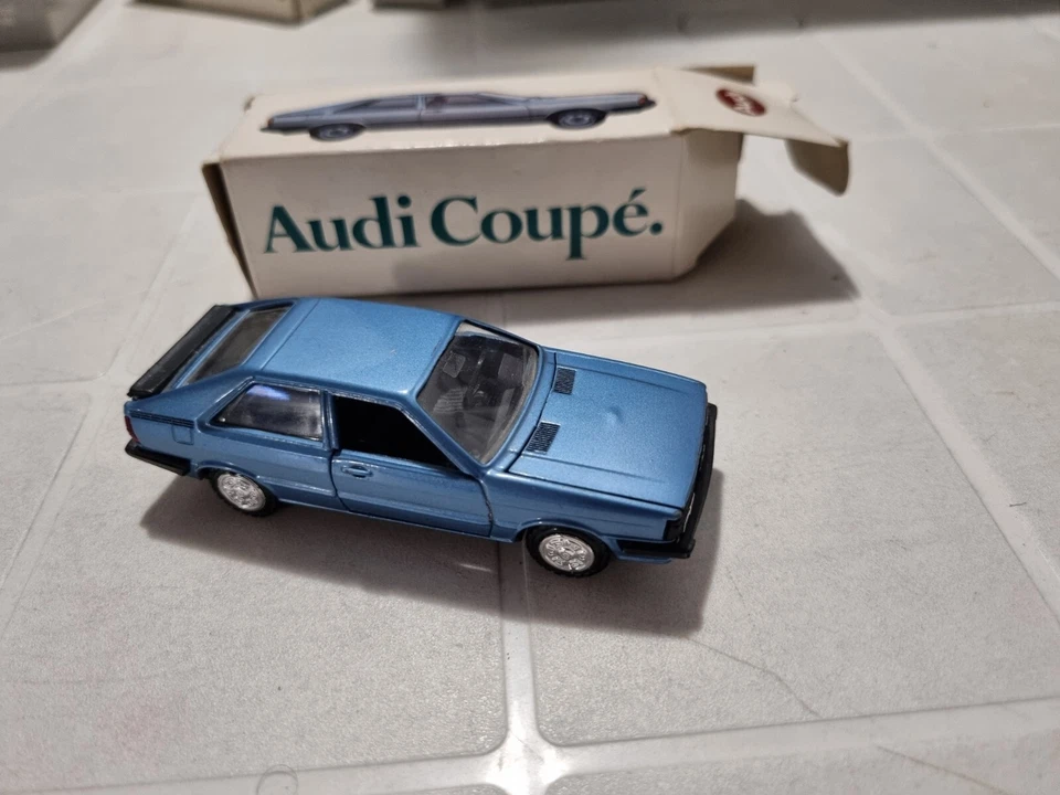 Conrad 1:43 Audi Coupè blue year 1984 ca. official perfect conditions - Immagine 1 di 4