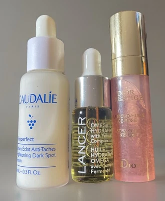 3 Lux Minis - Suero Caudalie Manchas Oscuras, Aceite Hidratante Lancer, Suero Dior Prestige Foto 1 de 4