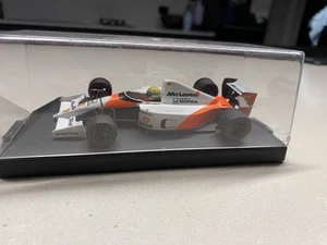Onyx McLaren Honda Ayrton Senna Car#1 in perspex case 1/43 scale - Picture 1 of 3