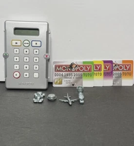 Monopoly 2005 elektronisches Bankgerät mit 4 Debitkarten & 4 Figuren getestet funktioniert - Bild 1 von 6