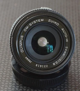 Olympus OM System Zuiko Lens. 24mm F/2.8 Auto-W. With Olympus caps. - Picture 1 of 7