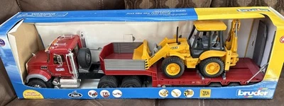 BRUDER MACK semi Truck with  loader cat and JCB 4CX Backhoe loader 02813 NIB 36" - Image 1 of 4