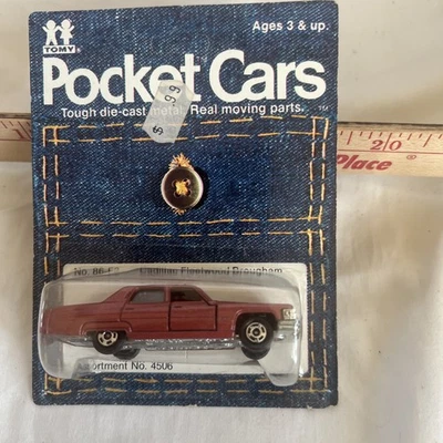 Coches de bolsillo vintage Cadillac Fleetwood Brougham No. Tomy F2 1:77 1974 nuevo Foto 1 de 4