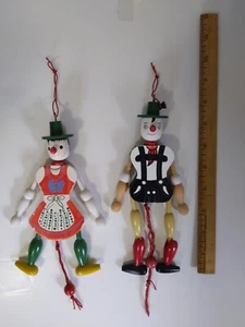 Vintage Wood Jumping Pull String Toy German Austrian Man Lederhosen Woman Dirndl - Picture 1 of 3