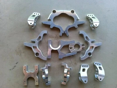 400$+ Value Serpent RC SDX4 Aluminum Parts Lot Bulkhead, Motor Mount, Hubs - Image 1 of 3
