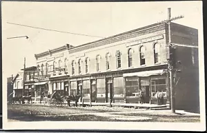 LIVONIA NY~REAL PHOTO POSTCARD RPPC~MAIN ST GANUNG CLOTHING STORE~HORSE & BUGGY - Picture 1 of 3