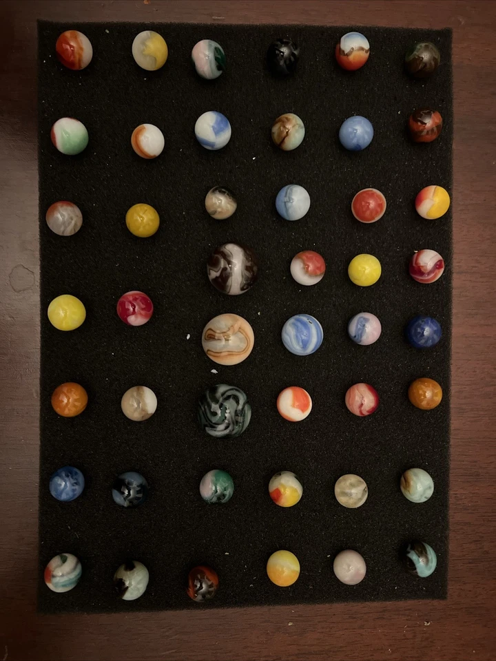 Hermoso Lote Mixto de Canicas Antiguas y Difíciles de Encontrar Vintage Venta Inmobiliaria. Foto 1 de 4