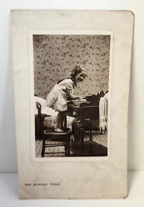 RPPC Small Girl Washing Her Morning Toilet Bamforth & Co Holmfirth & New York - Picture 1 of 12