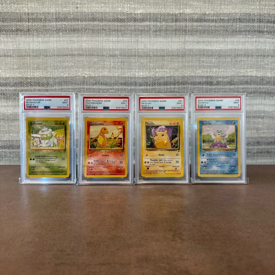 Bulbasaur, Charmander, Pikachu, & Squirtle Base Set 2 2000 - PSA 9 MINT - Image 1 of 2